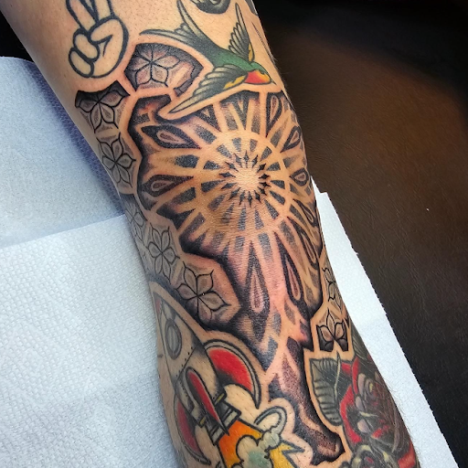 Explore tattoo photography ideas, creative tattoo ideas in Omaha, available at Collective Hive Tattoo