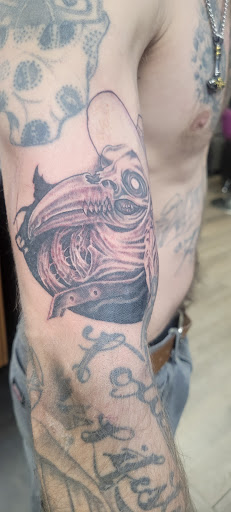 Explore family tree sleeve tattoo ideas, creative tattoo ideas in Las Vegas, available at Work of Art Tattoo and Piercing