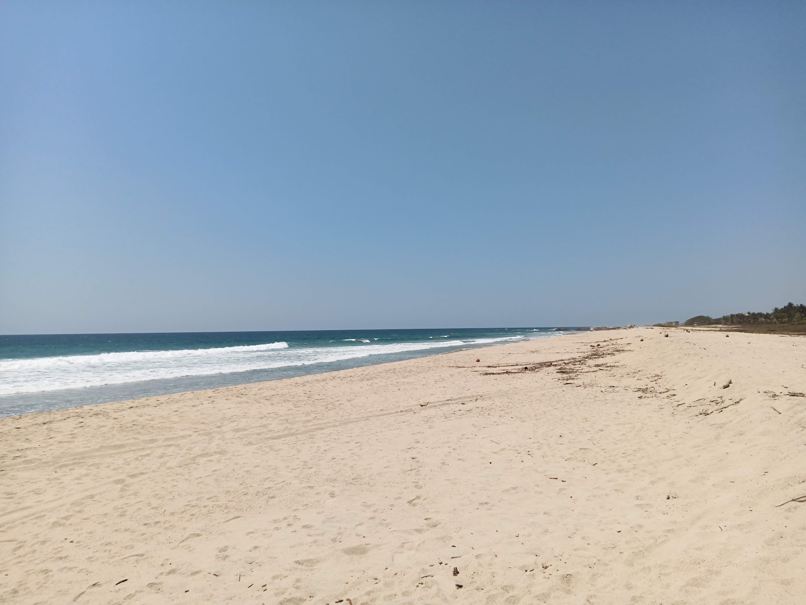 Photo de Playa Hornitos et le règlement
