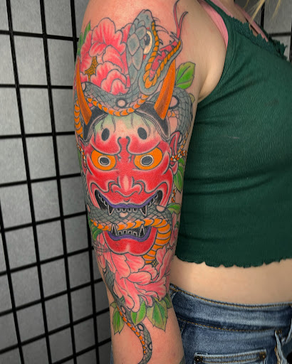 Explore shoulder tattoo ideas male, creative tattoo ideas in Edgewood, available at Wild Coyote Tattoo