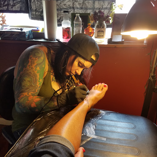 Explore mens tattoo cover up ideas, creative tattoo ideas in Boise, available at Ikon Tattoo and Body Piercing