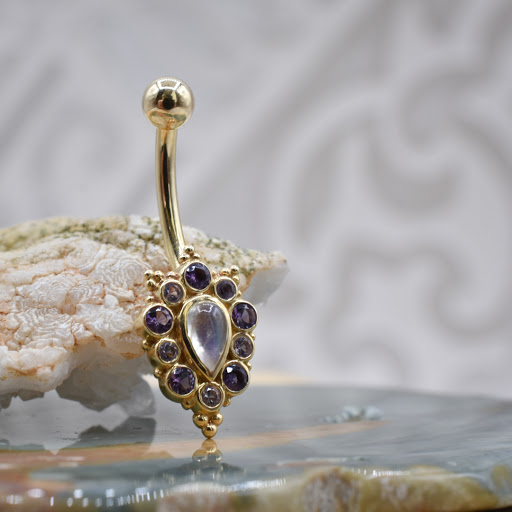 Explore cherry blossom tree tattoo ideas, creative tattoo ideas in Reno, available at Black Hole Body Piercing