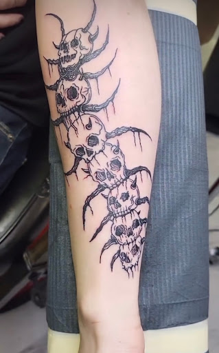 Explore suicide boys tattoo ideas, creative tattoo ideas in West Branch, available at Crossroads Tattoo