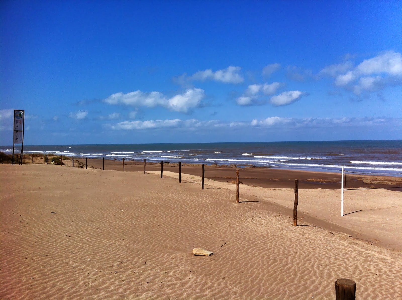 Photo de Plage Half Moon avec l'eau turquoise de surface