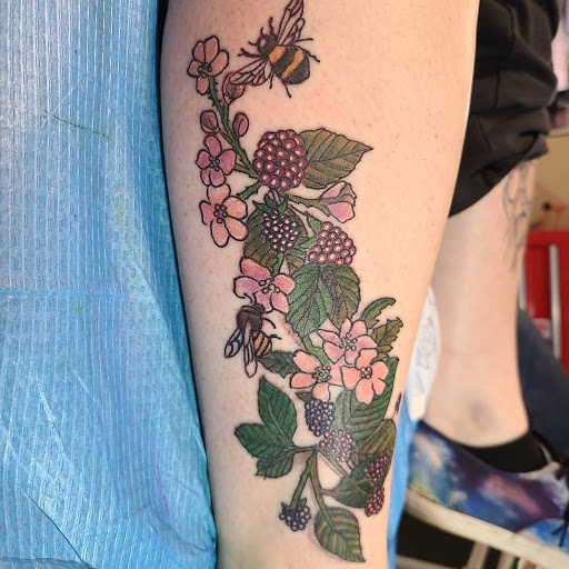 Explore tattoo flower sleeve ideas, creative tattoo ideas in Northampton, available at Inkglorious Custom Tattoo Studio