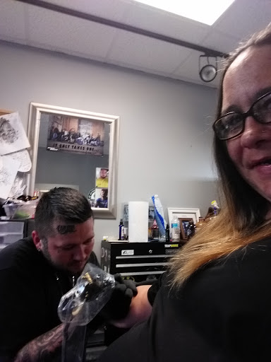 Explore tattoo son ideas, creative tattoo ideas in Auburndale, available at Soldiers Of Ink