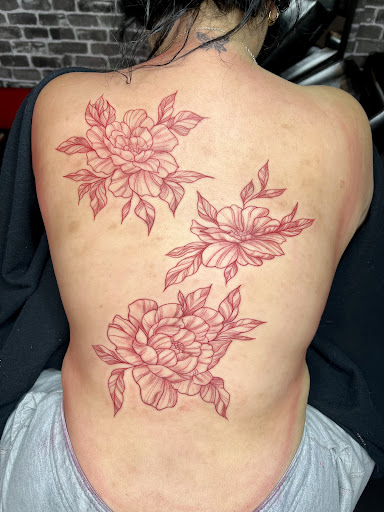 Explore cherry blossom tattoo ideas, creative tattoo ideas in Vancouver, available at New Ink Tattoo