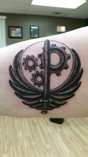 Explore tattoo ideas for women side, creative tattoo ideas in Decatur, available at Low Key Studios Tattoo & Piercing