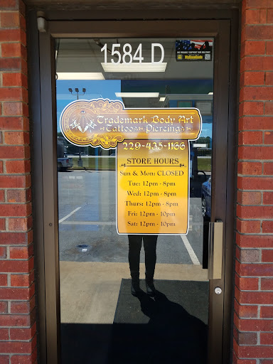 Explore broken clock tattoo ideas, creative tattoo ideas in Leesburg, available at Trademark Body Art