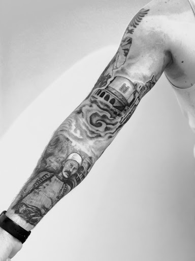 Explore upper back tattoo ideas, creative tattoo ideas in Scarsdale, available at Damm Nice Tattoo & Body Art