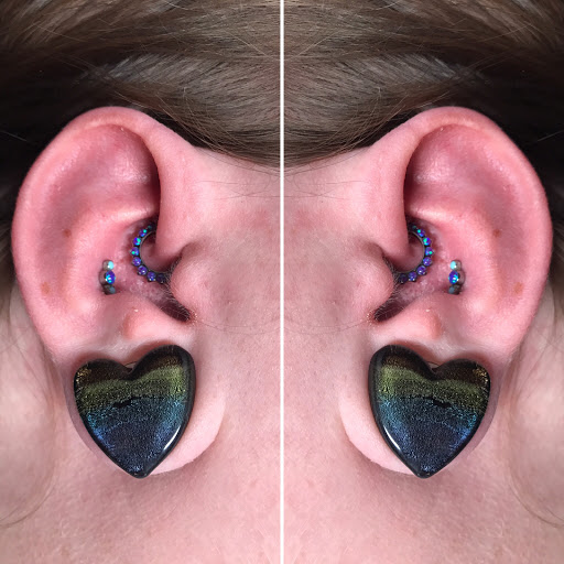 Explore true north tattoo ideas, creative tattoo ideas in Bloomington, available at Evil by the Needle Custom Tattoo and Piercing Studio