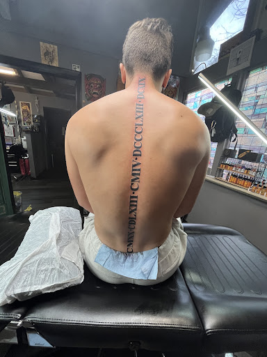 Find tattoo ideas black for your next unique tattoo in Green Cove Springs at Under Your Skin Tattoos