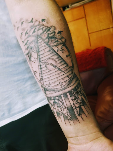 Explore back tattoo ideas for guys, creative tattoo ideas in Salem, available at Body Graphix Tattoo Studio