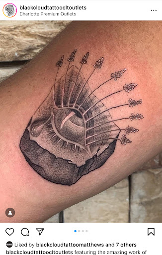 Explore baby tattoo ideas, creative tattoo ideas in Lawrenceville, available at Black Cloud Tattoo and Piercing