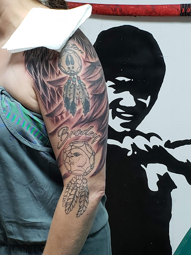 Explore name cover up tattoo ideas female, creative tattoo ideas in Owosso, available at Expressions Body Art Studio