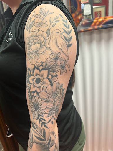 Explore black sleeve tattoo ideas, creative tattoo ideas in Anderson, available at FearlessTattoos and Piercing