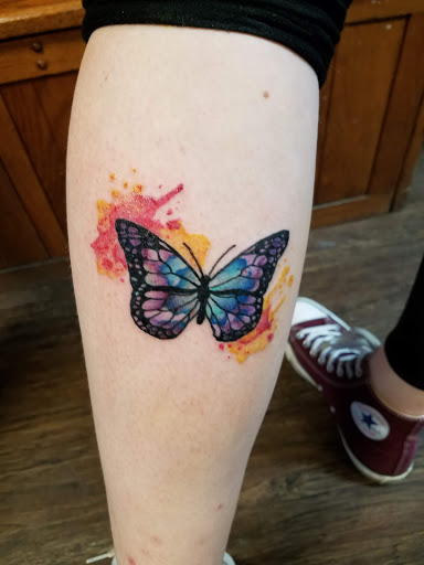 Explore athlete tattoo ideas, creative tattoo ideas in Osceola, available at Crowned Raven Tattoo Inc.