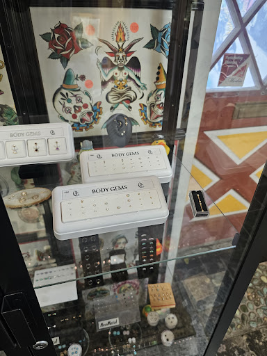 Explore tattoo ideas for guys calf, creative tattoo ideas in Media, available at Baker Street Tattoo