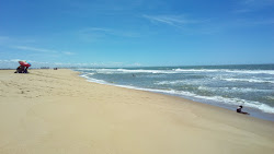 Foto di Praia de Iquipari con costa lunga e dritta