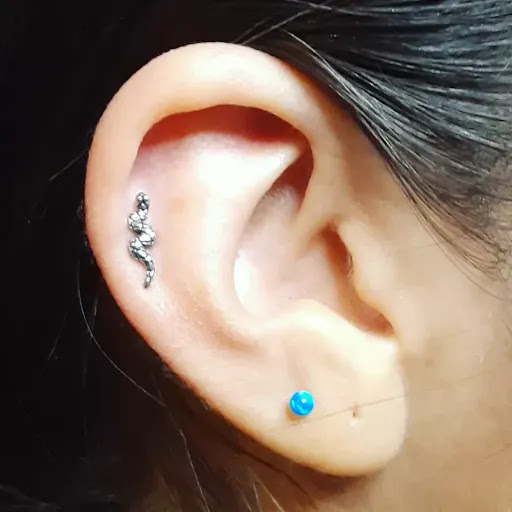 Find bracelet tattoo ideas for females for your next unique tattoo in El Paso at Whiskeys piercings