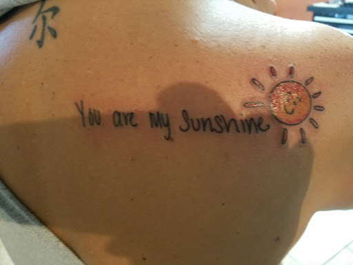 Explore halloween tattoo ideas for women, creative tattoo ideas in Joplin, available at Brickhaus Tattoo & Piercing