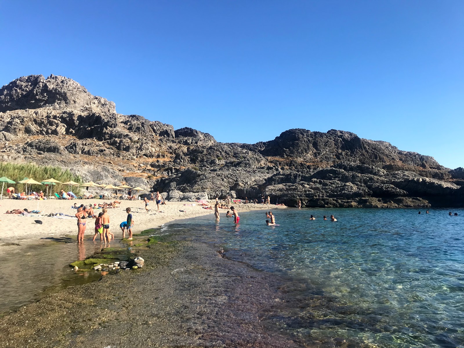 Foto von Ammoudi Strand mit kleine bucht