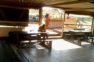 Mochoma Pub & Grills image