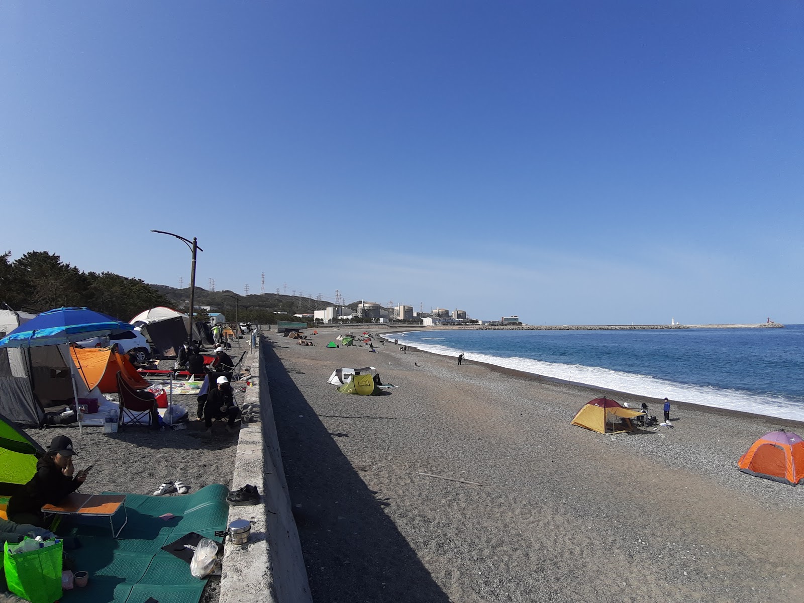 Fotografija Naa Beach in naselje