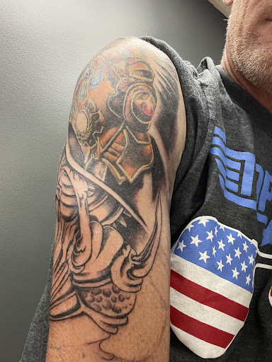 Explore african american tattoo ideas, creative tattoo ideas in Hernando, available at Watts Studio Tattoos