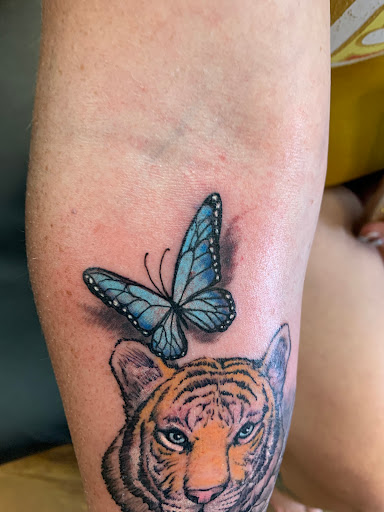 Explore foot tattoo ideas for female, creative tattoo ideas in Minot, available at Psychward Tattoos and Piercings