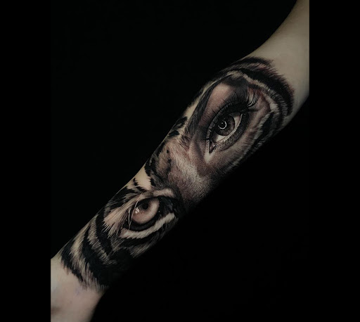 Explore cowboy boot tattoo ideas, creative tattoo ideas in Hollywood, available at Sacred Eye Tattoos