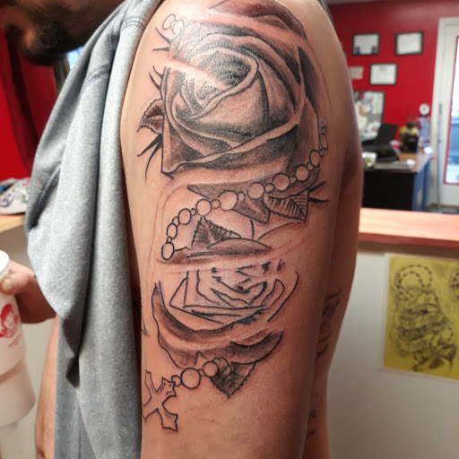 Explore tattoo word cover up ideas, creative tattoo ideas in Newport, available at T N T Explosive Tattoo