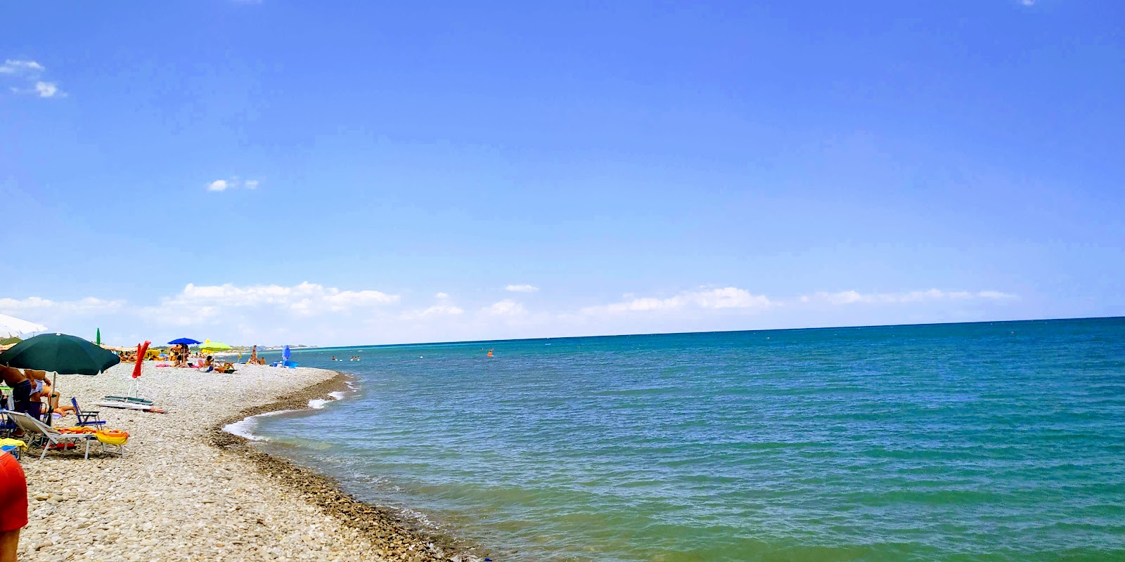 Foto van Spiaggia Rocca Imperiale met recht en lang