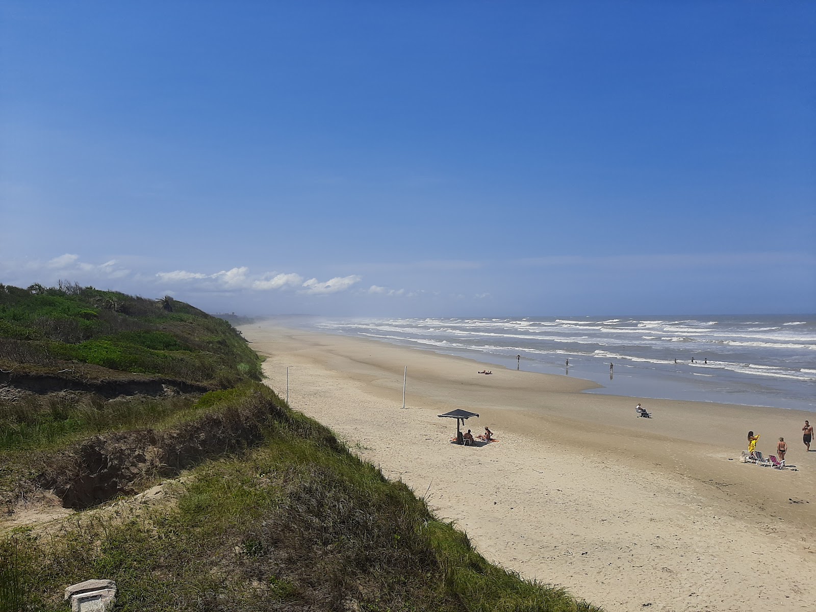 Foto de Playa la Coronilla con arena brillante superficie