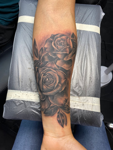 Explore christmas tree tattoo ideas, creative tattoo ideas in Clarksville, available at All American Tattoo Co