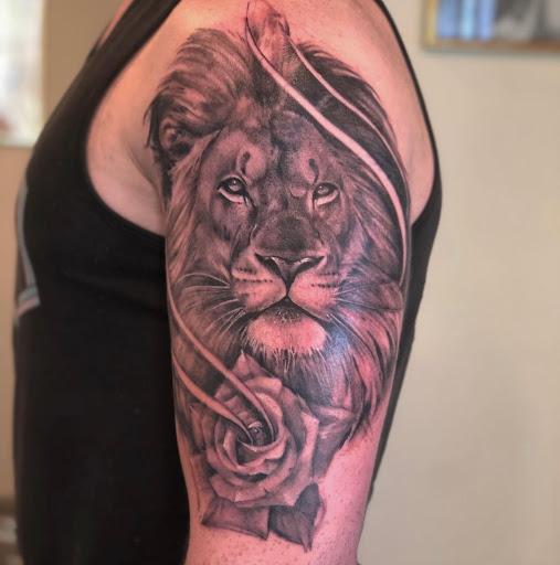 Explore snake tattoo ideas for females, creative tattoo ideas in Jackson, available at 21 Blooms tattoo studio