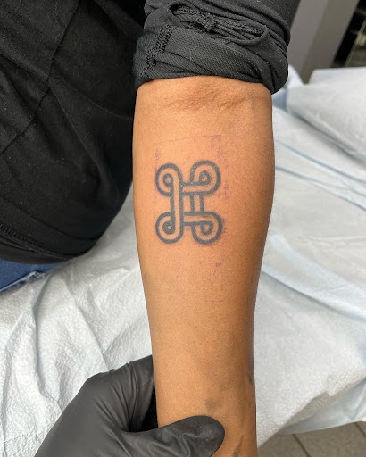 Explore pistol tattoo ideas, creative tattoo ideas in Houston, available at 333 Tattoo Studio HTX