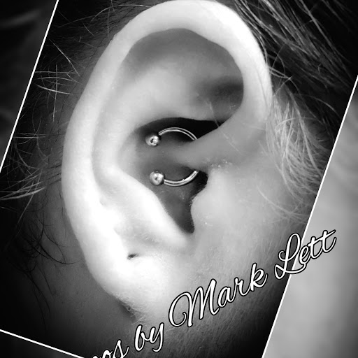 Explore cowboy boot tattoo ideas, creative tattoo ideas in Saint Petersburg, available at Edens Apple Tattoos and Piercings