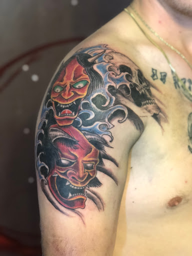 Explore upper back tattoo ideas for guys, creative tattoo ideas in Madison, available at ART IMMORTAL TATTOO