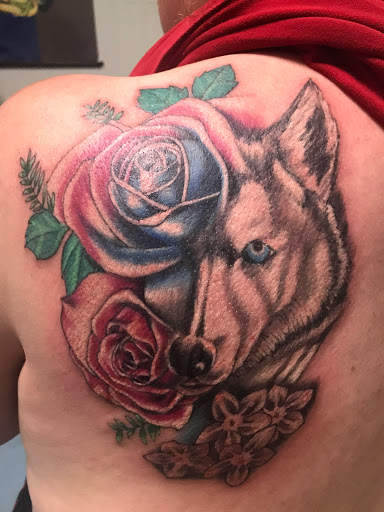 Explore dahlia tattoo ideas, creative tattoo ideas in Muncie, available at The Tattoo Studio