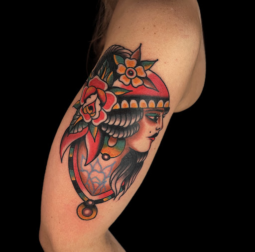 Explore behind the ear tattoo ideas, creative tattoo ideas in Johnson City, available at Gold Cross Tattoo Co.