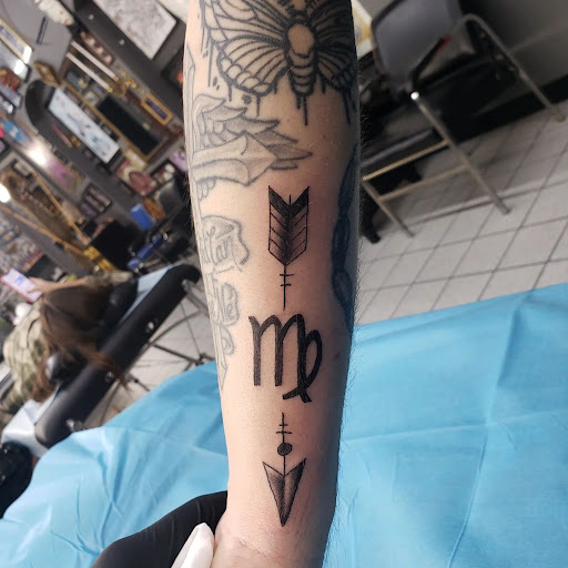 Explore strength tattoo ideas, creative tattoo ideas in Houston, available at 333 Tattoo Studio HTX