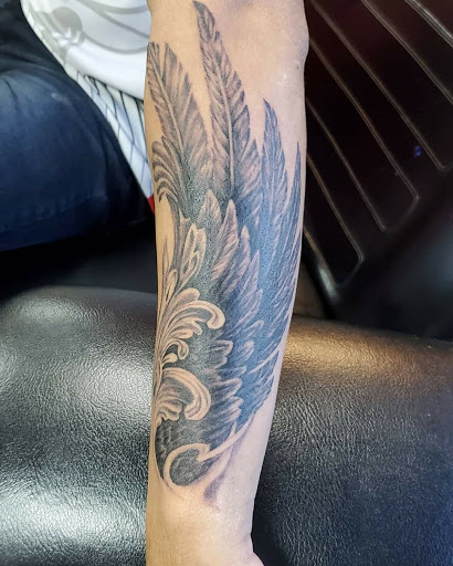 Explore dragon tattoo ideas for guys, creative tattoo ideas in Reno, available at Evolution Tattoo
