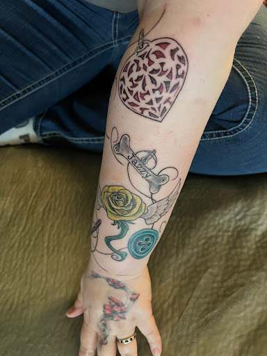 Explore back ear tattoo ideas, creative tattoo ideas in Green Bay, available at Darkside Tattoo By Jesse Skywalker