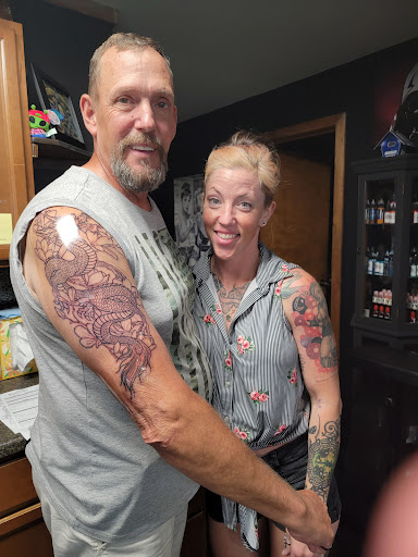 Explore back piece tattoo ideas, creative tattoo ideas in Topeka, available at Absolute Tattoo