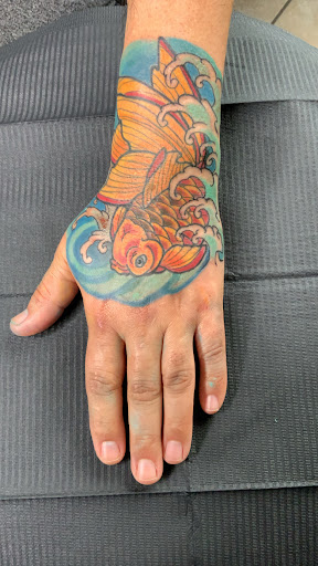 Explore love is pain tattoo ideas, creative tattoo ideas in El Paso, available at Santa Rosa Tattoo Studio