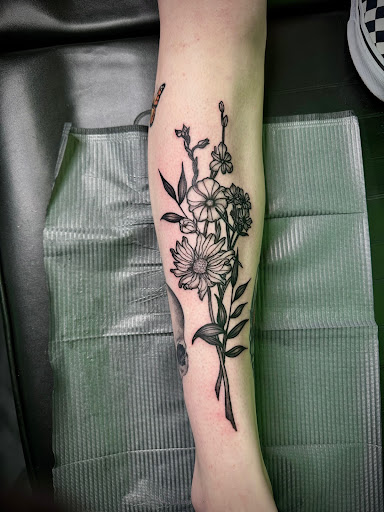 Explore tramp stamp lower back tattoo cover up ideas, creative tattoo ideas in Peoria, available at Modern Ink Tattoo