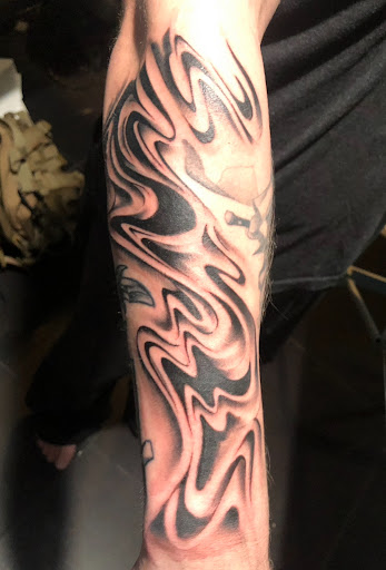 Explore collar tattoo ideas, creative tattoo ideas in Webster, available at Mainline Ink