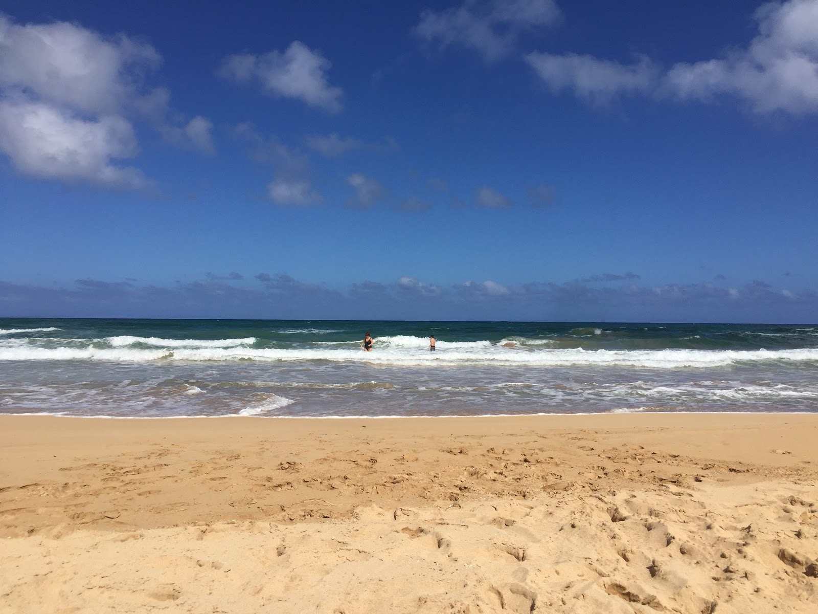 Photo de Kitchens Beach avec l'eau cristalline de surface