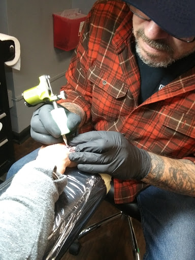 Explore wing tattoo ideas for guys, creative tattoo ideas in Greensboro, available at Fern Piercing and Fine Jewelry